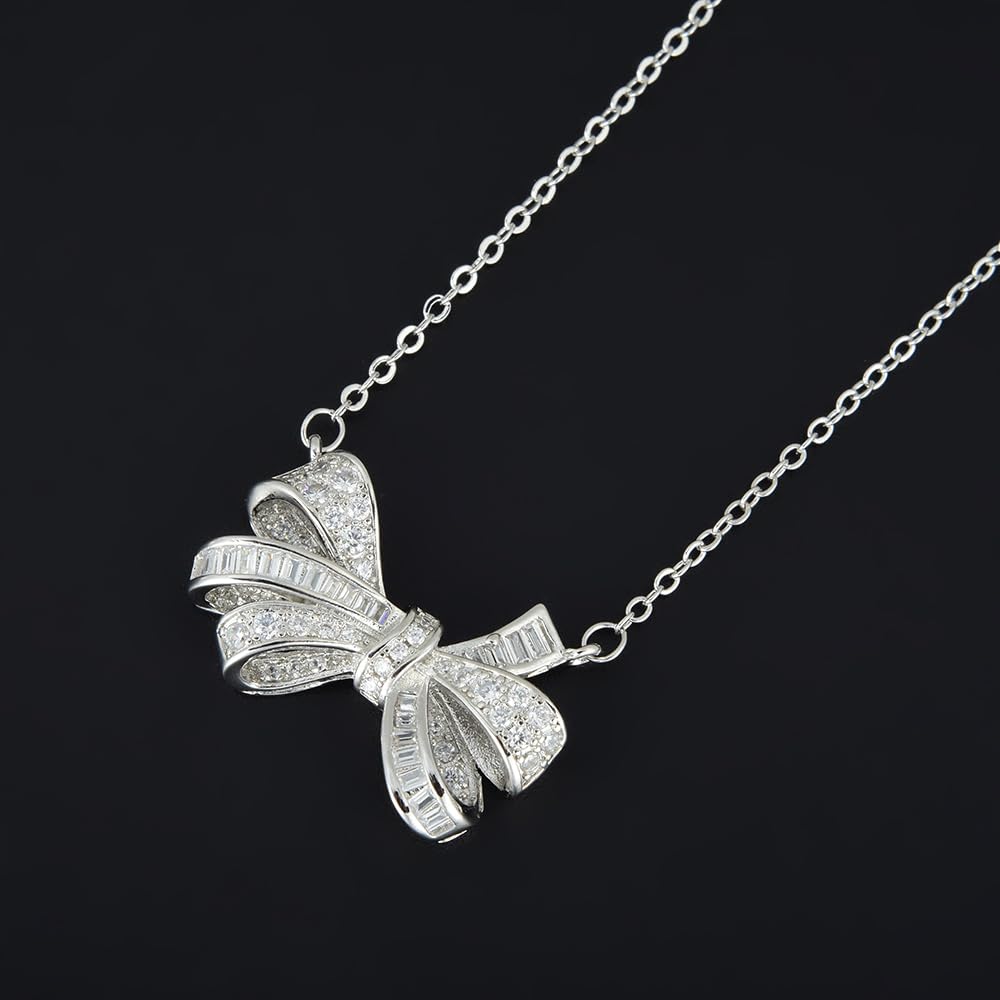 RIZILIA 18K White Gold Plated Cubic Zirconia Bow Pendant Necklace for Women | Elegant Diamond-Cut CZ Gemstone Jewelry | Trendy Bow Design, Gift for Her (Multiple Colors Available)