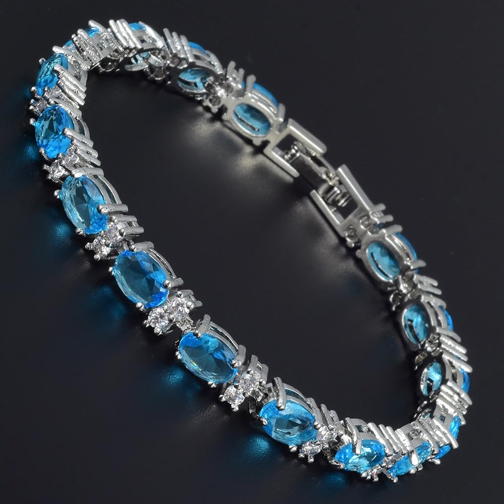 RIZILIA Oval Cut Multi-Color CZ Birthstone 18K White Gold Plated Tennis Bracelet, 7"