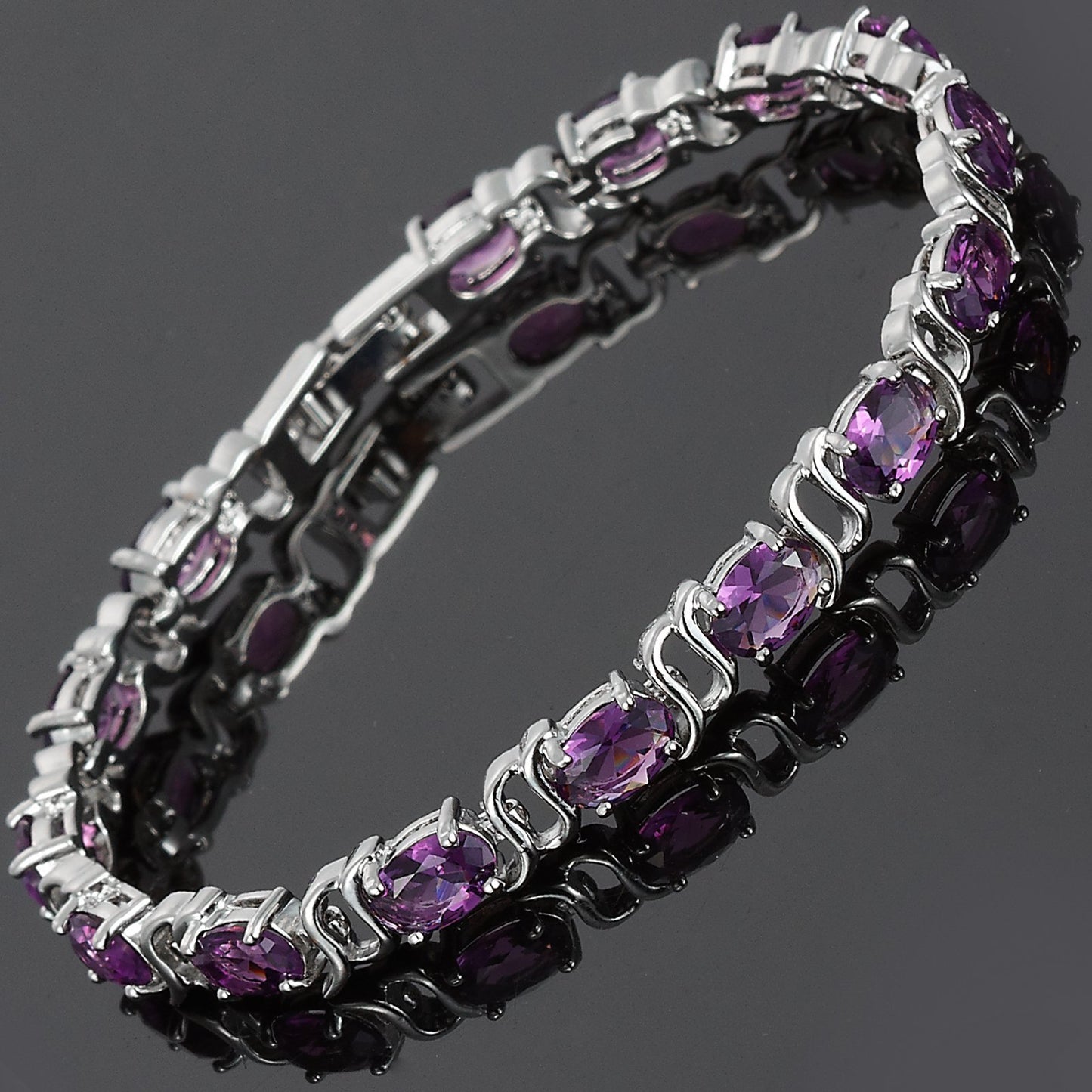 RIZILIA Oval Cut Multi-Color CZ 18K White Gold Plated Tennis Bracelet, 7"