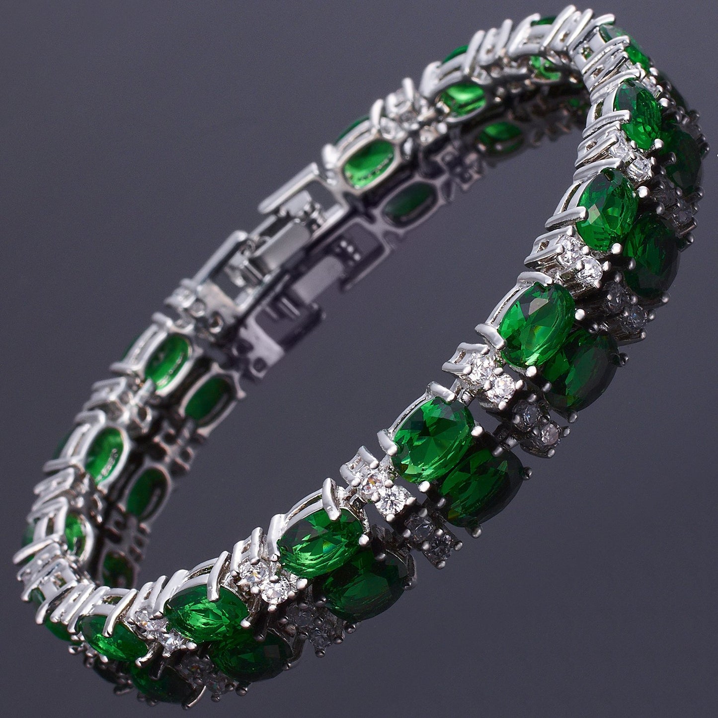 RIZILIA Oval Cut Multi-Color CZ Birthstone 18K White Gold Plated Tennis Bracelet, 7"