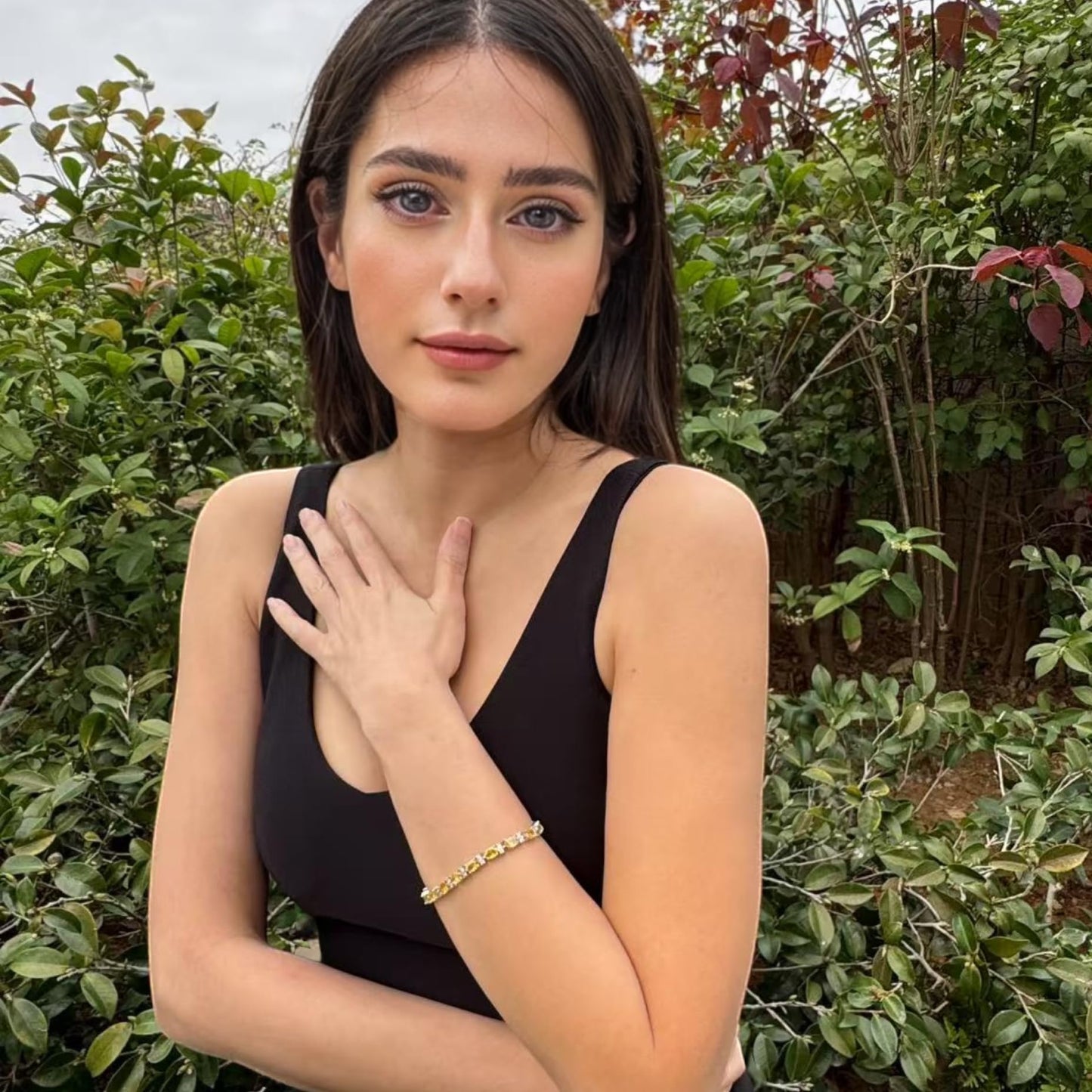 RIZILIA Oval Cut Multi-Color CZ Birthstone 18K White Gold Plated Tennis Bracelet, 7"