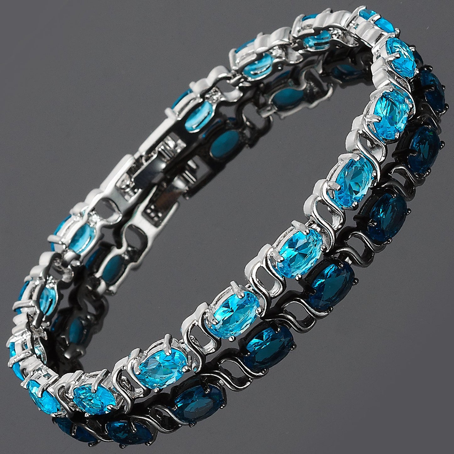 RIZILIA Oval Cut Multi-Color CZ 18K White Gold Plated Tennis Bracelet, 7"