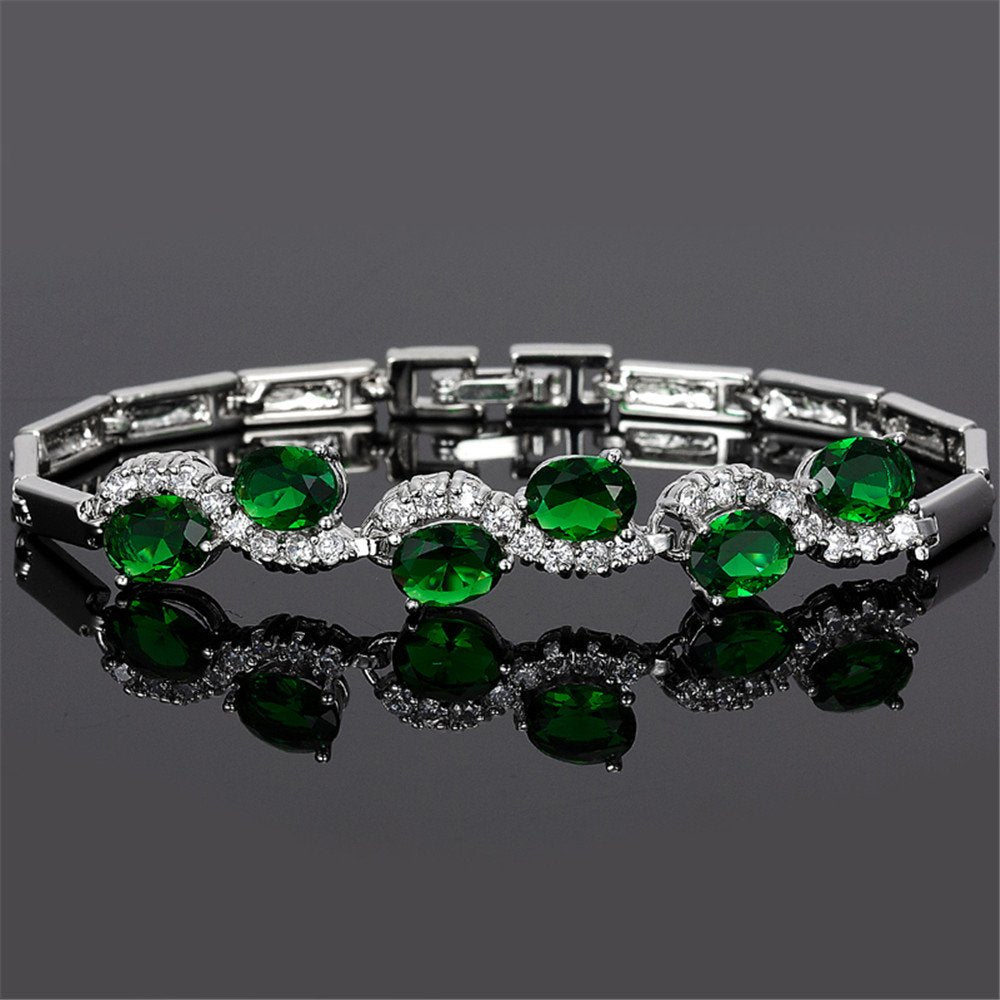 RIZILIA Tennis Bracelet & Oval Cut CZ [6 Colors available] in White Gold Plated, 7"