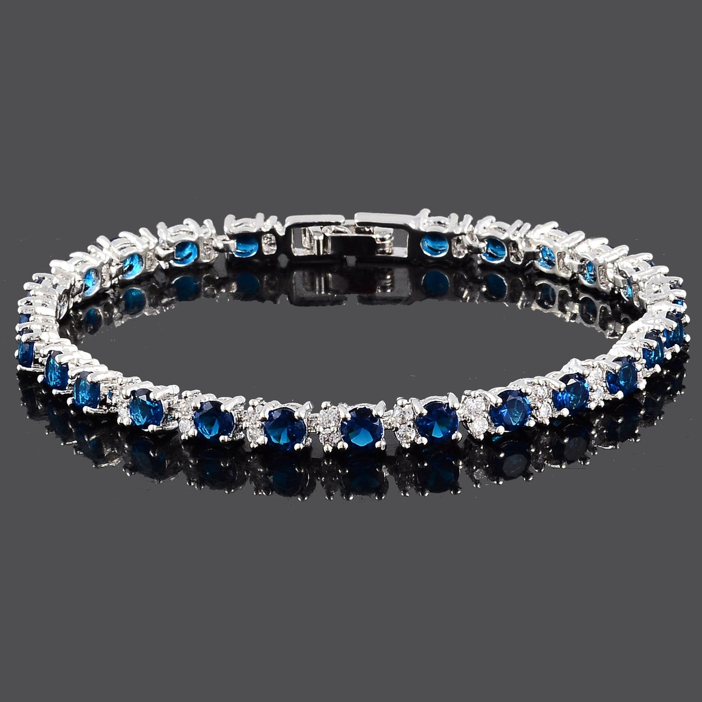 RIZILIA Round Multi-Color CZ Birthstone White Gold Plated Tennis Bracelet, 7"