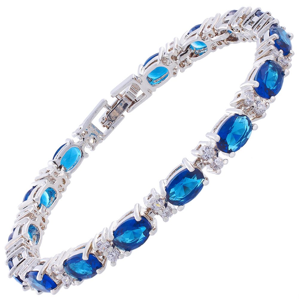 RIZILIA Oval Cut Multi-Color CZ Birthstone 18K White Gold Plated Tennis Bracelet, 7"