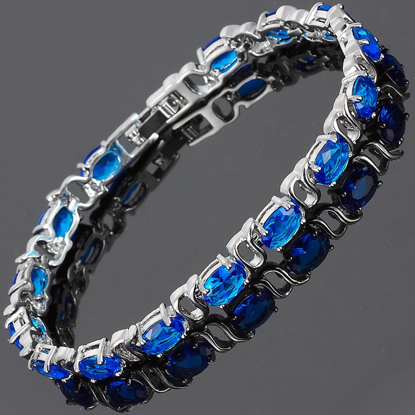 RIZILIA Oval Cut Multi-Color CZ 18K White Gold Plated Tennis Bracelet, 7"